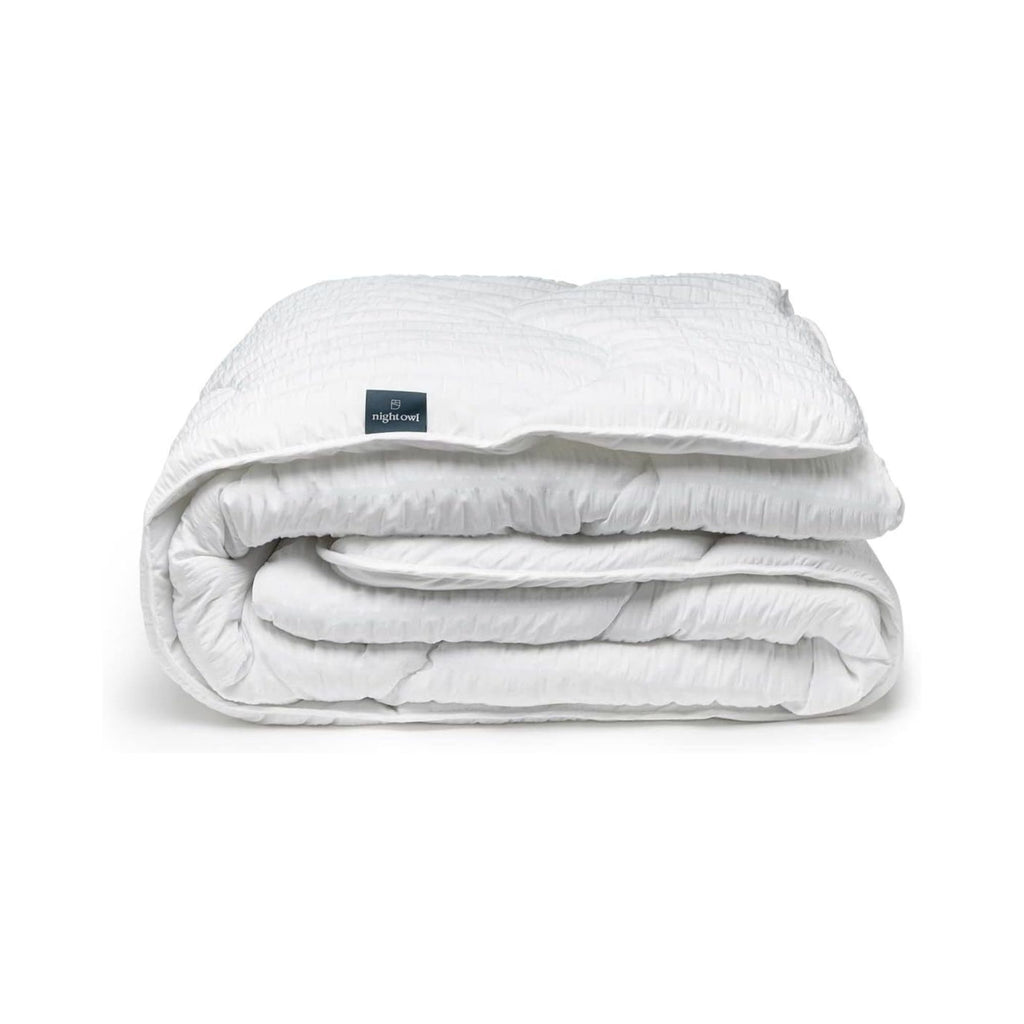 Night Owl® Wide Seersucker Coverless Duvet in White folded up